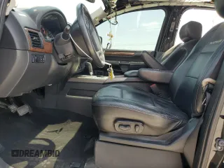 2014 Nissan Armada Platinum z VIN 5N1BA0NF8EN610981, wystawiony jako Copart lot #53144515 z przebiegiem 188 423 mil mil oraz Szkoda całkowita • Salvage title. Historia ofert i sprzedaży dostępna na DreamBid. Obrazek 7.
