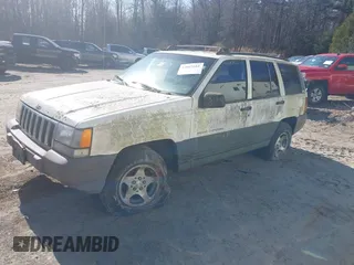 1996 Jeep Grand Cherokee Laredo with VIN 1J4GZ58Y7TC381600, listed as a IAAI auction lot 42065681 with 1 mi miles. Bid and sale history available at carsss.com. Image 2.