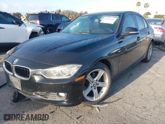 2015 BMW 3 Series 328i with VIN WBA3C1C55FK119562, listed as a IAAI auction lot 41945606 with 51,922 mi miles and . Bid and sale history available at DreamBid. Image 2.