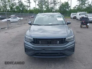 2024 Volkswagen Tiguan SE with VIN 3VV3B7AX8RM134486, listed as a IAAI auction lot 42095457 with 21,295 mi miles and . Bid and sale history available at DreamBid. Image 12.