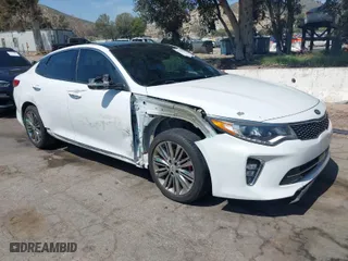 2018 Kia Optima SX with VIN 5XXGV4L22JG248495, listed as a IAAI auction lot 41992335 with 65,879 mi miles. Bid and sale history available at carsss.com. Image 1.