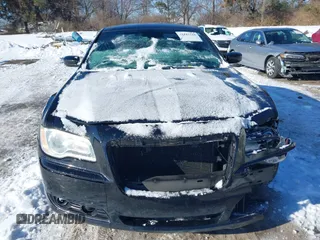 2012 Chrysler 300 S with VIN 2C3CCABG7CH140782, listed as a IAAI auction lot 41343344 with 244,577 mi miles and . Bid and sale history available at carsss.com. Image 12.