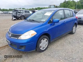 2009 Nissan Versa 1.8 S with VIN 3N1BC13E79L425943, listed as a IAAI auction lot 42198557 with 217,059 mi miles. Bid and sale history available at carsss.com. Image 2.
