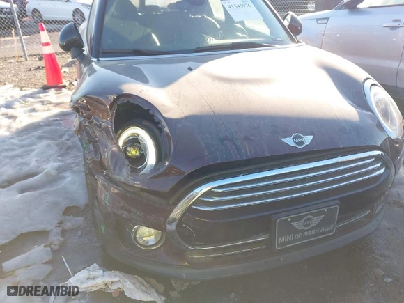 2016 MINI Cooper Clubman with VIN WMWLN5C50G2E29740, listed as a IAAI auction lot 41345976 with 67,124 mi miles. Bid and sale history available at carsss.com. Image 6.