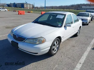 1998 Mercury Mystique z VIN 1MEFM66L2WK653881, wystawiony jako IAAI lot #41807702 z przebiegiem 119 158 mil mil oraz . Historia ofert i sprzedaży dostępna na DreamBid. Obrazek 2.