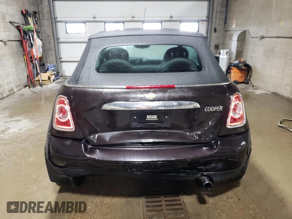 2015 MINI Convertible z VIN WMWZN3C59FT266929, wystawiony jako Copart lot #57264985 z przebiegiem 110 200 mil mil oraz Szkoda całkowita • Salvage title. Historia ofert i sprzedaży dostępna na DreamBid. Obrazek 6.