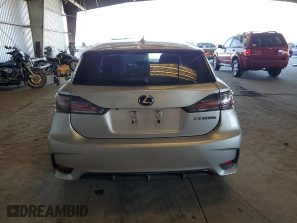 2014 Lexus CT 200h with VIN JTHKD5BH9E2194955, listed as a Copart auction lot 64379975 with 60,875 mi miles and Salvage title. Bid and sale history available at DreamBid. Image 6.
