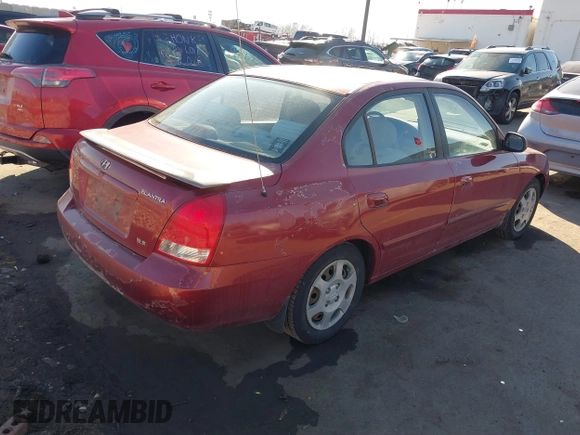 2003 Hyundai Elantra GLS z VIN KMHDN45D93U469313, wystawiony jako IAAI lot #41697422 z przebiegiem 178 571 mil mil oraz . Historia ofert i sprzedaży dostępna na DreamBid. Obrazek 4.