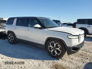 2023 Rivian R1S Adventure with VIN 7PDSGBBA4PN022157, listed as a Copart auction lot 81359984 with 13,522 mi miles and Salvage Title. Bid and sale history available at DreamBid. Image 4.