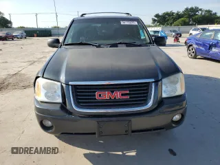 2004 GMC Envoy SLE z VIN 1GKDT13S842242030, wystawiony jako Copart lot #56712035 z przebiegiem 186 749 mil mil oraz Szkody całkowita. Historia ofert i sprzedaży dostępna na DreamBid. Obrazek 5.