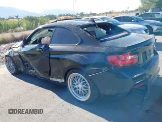 2014 BMW 2 Series M235i with VIN WBA1J7C50EVX33903, listed as a IAAI auction lot 40207684 with 81,766 mi miles and . Bid and sale history available at DreamBid. Image 3.