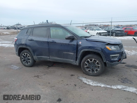 2020 Jeep Compass Trailhawk with VIN 3C4NJDDB3LT143926, listed as a IAAI auction lot 41368613 with 61,909 mi miles and . Bid and sale history available at carsss.com. Image 13.