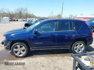 2014 Jeep Compass Latitude with VIN 1C4NJCEB2ED883243, listed as a IAAI auction lot 41989007 with 138,192 mi miles. Bid and sale history available at carsss.com. Image 15.