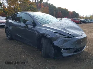 2023 Tesla Model Y Performance z VIN 7SAYGDEF1PF846459, wystawiony jako IAAI lot #40663935 z przebiegiem 12 077 mil mil oraz . Historia ofert i sprzedaży dostępna na DreamBid. Obrazek 1.