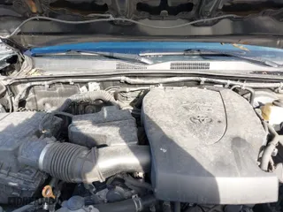 2019 Toyota Tacoma 4WD SR with VIN 3TMCZ5ANXKM200572, listed as a IAAI auction lot 41504215 with 142,375 mi miles. Bid and sale history available at carsss.com. Image 10.