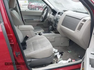 2011 Ford Escape XLT with VIN 1FMCU0D70BKB19310, listed as a IAAI auction lot 42100801 with 211,028 mi miles. Bid and sale history available at carsss.com. Image 5.