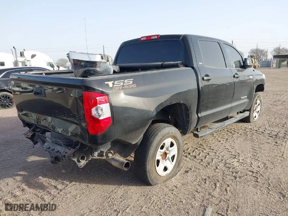 2014 Toyota Tundra 2WD Truck SR5 with VIN 5TFEY5F14EX153233, listed as a IAAI auction lot 41696120 with 124,162 mi miles. Bid and sale history available at carsss.com. Image 4.