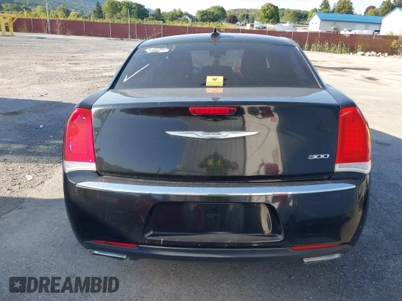 2015 Chrysler 300 Limited with VIN 2C3CCAAGXFH779843, listed as a IAAI auction lot 40284433 with 251,182 mi miles and . Bid and sale history available at DreamBid. Image 17.