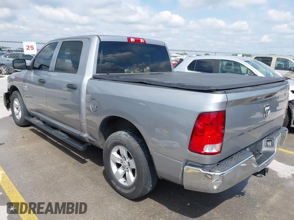 2019 Ram 1500 Tradesman z VIN 3C6RR6KG0KG705946, wystawiony jako IAAI lot #42217999 z przebiegiem 99 460 mil mil oraz . Historia ofert i sprzedaży dostępna na DreamBid. Obrazek 3.