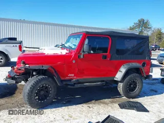 2005 Jeep Wrangler Unlimited with VIN 1J4FA44S05P375941, listed as a IAAI auction lot 41420299 with 138,859 mi miles. Bid and sale history available at carsss.com. Image 14.