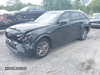 2024 Mazda CX-90 Preferred z VIN JM3KKBHD6R1118705, wystawiony jako IAAI lot #42135120 z przebiegiem 23 347 mil mil oraz . Historia ofert i sprzedaży dostępna na DreamBid. Obrazek 2.
