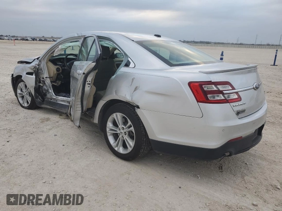 2013 Ford Taurus SEL with VIN 1FAHP2E98DG150183, listed as a Copart auction lot 87481264 with 74,065 mi miles and Salvage Title. Bid and sale history available at DreamBid. Image 2.