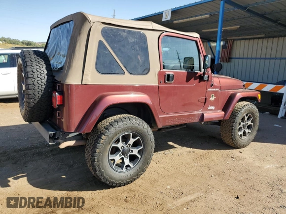 2002 Jeep Wrangler Sahara with VIN 1J4FA59S92P708647, listed as a Copart auction lot 74851654 with 131,794 mi miles and Salvage Title. Bid and sale history available at carsss.com. Image 3.