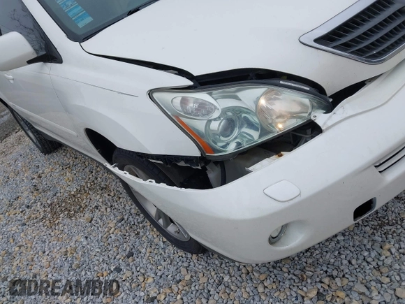 2007 Lexus RX 400h with VIN JTJGW31U572004833, listed as a IAAI auction lot 41938575 with 221,084 mi miles and . Bid and sale history available at DreamBid. Image 12.