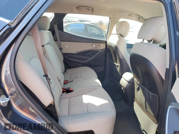 2018 Hyundai Santa Fe 2.4L z VIN 5XYZTDLB5JG568579, wystawiony jako Copart lot #82534794 z przebiegiem 130 032 mil mil oraz Szkoda całkowita • Salvage title. Historia ofert i sprzedaży dostępna na DreamBid. Obrazek 11.