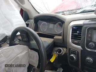 2014 Ram 1500 SLT z VIN 1C6RR6GT6ES408358, wystawiony jako IAAI lot #42038597 z przebiegiem Nie podano mil oraz . Historia ofert i sprzedaży dostępna na DreamBid. Obrazek 7.