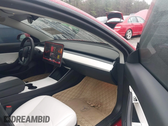 2018 Tesla Model 3 Long Range Battery z VIN 5YJ3E1EB7JF135199, wystawiony jako IAAI lot #41580853 z przebiegiem 131 774 mil mil oraz . Historia ofert i sprzedaży dostępna na DreamBid. Obrazek 5.