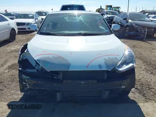 2016 Hyundai Veloster z VIN KMHTC6AD3GU267365, wystawiony jako IAAI lot #41469796 z przebiegiem 111 791 mil mil oraz . Historia ofert i sprzedaży dostępna na DreamBid. Obrazek 13.
