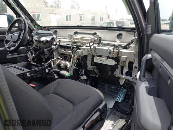 2021 Land Rover Defender with VIN SALEK6RX9M2059022, listed as a IAAI auction lot 42396995 with 53,015 mi miles and . Bid and sale history available at DreamBid. Image 5.