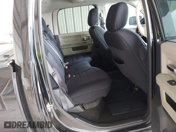 2009 Dodge 1500 SLT with VIN 1D3HB13T49S712884, listed as a IAAI auction lot 41428616 with 213,978 mi miles and . Bid and sale history available at DreamBid. Image 8.