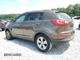 2011 Kia Sportage with VIN KNDPB3A2XB7029543, listed as a Copart auction lot 62838895 with 287,752 mi miles and Clean title. Bid and sale history available at DreamBid. Image 2.