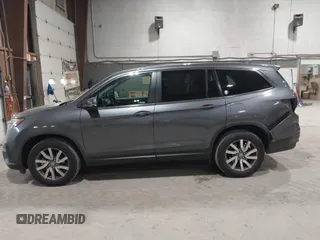 2019 Honda Pilot EX-L with VIN 5FNYF6H51KB099825, listed as a IAAI auction lot 42421688 with 51,370 mi miles and . Bid and sale history available at DreamBid. Image 14.
