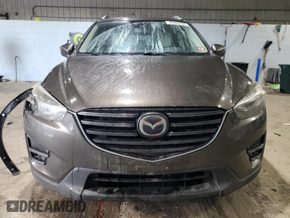 2016 Mazda CX-5 Grand Touring with VIN JM3KE4DY0G0765406, listed as a Copart auction lot 46499385 with 116,155 mi miles and Salvage Title. Bid and sale history available at carsss.com. Image 5.