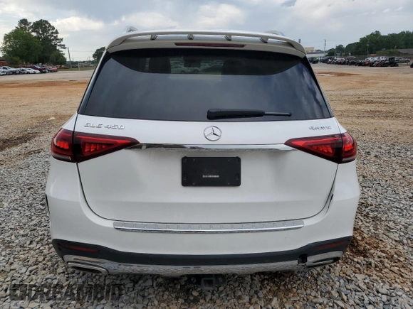2022 Mercedes-Benz GLE 450 with VIN 4JGFB5KB9NA659899, listed as a Copart auction lot 56852885 with 31,324 mi miles and Salvage title. Bid and sale history available at DreamBid. Image 6.
