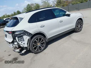 2021 Porsche Cayenne z VIN WP1AA2AY2MDA02749, wystawiony jako IAAI lot #41944514 z przebiegiem 97 493 mil mil oraz . Historia ofert i sprzedaży dostępna na DreamBid. Obrazek 4.