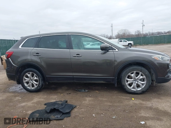 2015 Mazda CX-9 Touring with VIN JM3TB2CA5F0469348, listed as a IAAI auction lot 41516084 with 134,460 mi miles. Bid and sale history available at carsss.com. Image 14.