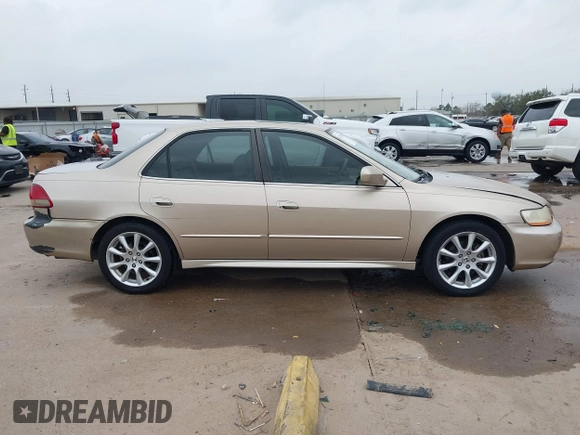 2001 Honda Accord EX z VIN 1HGCG165X1A077702, wystawiony jako IAAI lot #41770556 z przebiegiem 149 516 mil mil oraz . Historia ofert i sprzedaży dostępna na DreamBid. Obrazek 13.