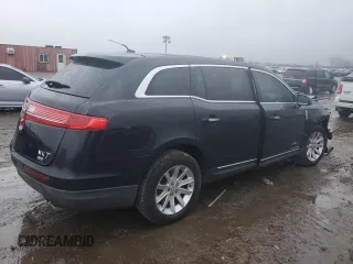 2015 Lincoln MKT with VIN 2LMHJ5NK1FBL04078, listed as a Copart auction lot 86774444 with 547,015 mi miles and Salvage Title. Bid and sale history available at DreamBid. Image 3.
