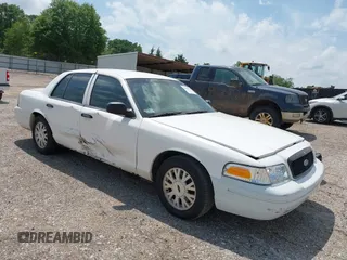 2008 Ford Police Interceptor z VIN 2FAFP71V98X142469, wystawiony jako IAAI lot #42013775 z przebiegiem 287 577 mil mil oraz . Historia ofert i sprzedaży dostępna na DreamBid. Obrazek 1.