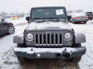 2017 Jeep Wrangler Unlimited Sahara with VIN 1C4BJWEG4HL591149, listed as a IAAI auction lot 41542157 with 70,630 mi miles. Bid and sale history available at carsss.com. Image 12.