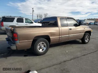 2000 Dodge Ram 1500 with VIN 3B7HC13Z8YM241128, listed as a Copart auction lot 76496774 with 125,929 mi miles and Salvage Title. Bid and sale history available at carsss.com. Image 3.