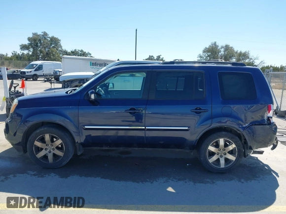 2013 Honda Pilot Touring with VIN 5FNYF3H94DB018384, listed as a IAAI auction lot 41672767 with 188,922 mi miles and . Bid and sale history available at DreamBid. Image 14.