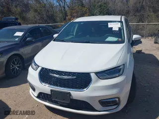2023 Chrysler Pacifica Hybrid Touring L with VIN 2C4RC1L74PR579720, listed as a IAAI auction lot 41762445 with 38,095 mi miles. Bid and sale history available at carsss.com. Image 12.