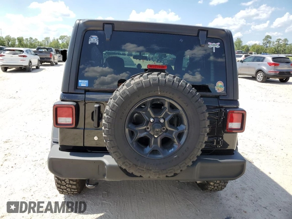 2023 Jeep Wrangler Sport with VIN 1C4HJXAG3PW672856, listed as a Copart auction lot 70444274 with 6,077 mi miles and Salvage title. Bid and sale history available at DreamBid. Image 6.