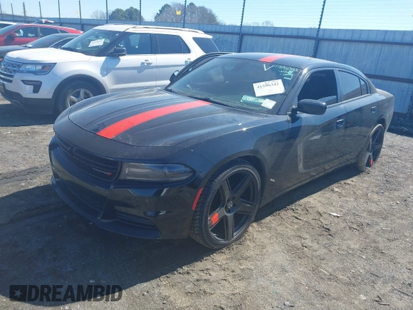 2020 Dodge Charger SXT with VIN 2C3CDXBG2LH229627, listed as a IAAI auction lot 41596342 with 124,012 mi miles and . Bid and sale history available at DreamBid. Image 2.