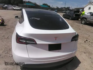 2022 Tesla Model Y Long Range z VIN 7SAYGDEE3NF385933, wystawiony jako IAAI lot #42059675 z przebiegiem 88 488 mil mil oraz . Historia ofert i sprzedaży dostępna na DreamBid. Obrazek 15.